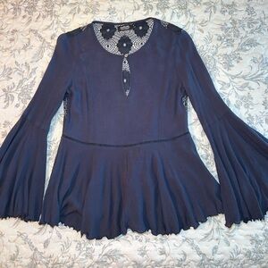 Elegant Long Sleeve Navy Blouse Crocheted Back Flare Peplum Waist and Sleeves